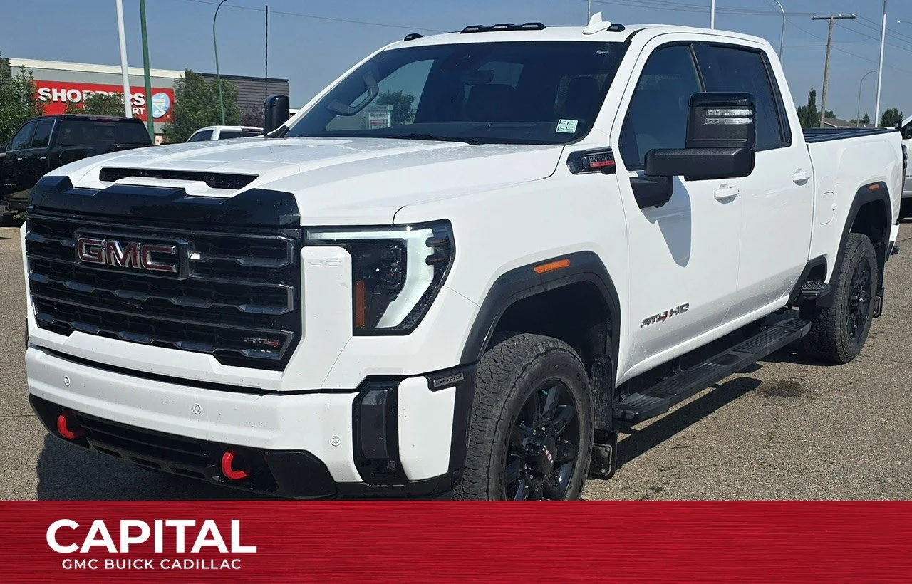 Used 2024 White GMC AT4 Crew Cab image 1