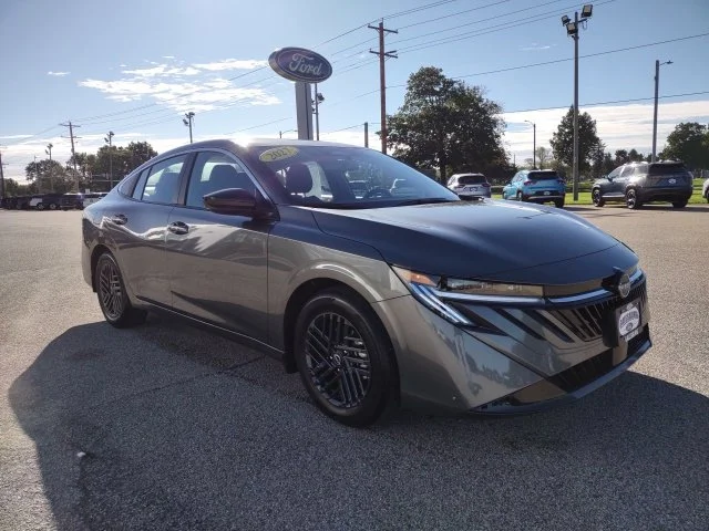 Used 2027 Gun Metallic Nissan SV image 8