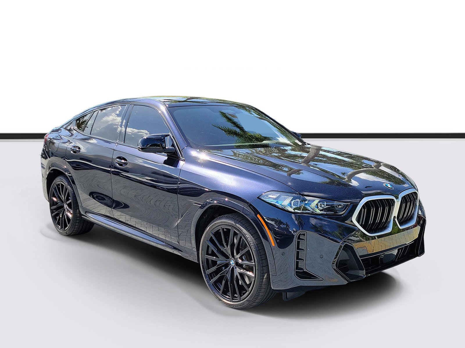 Certified Used 2025 Carbon Black Metallic BMW M60i image 1