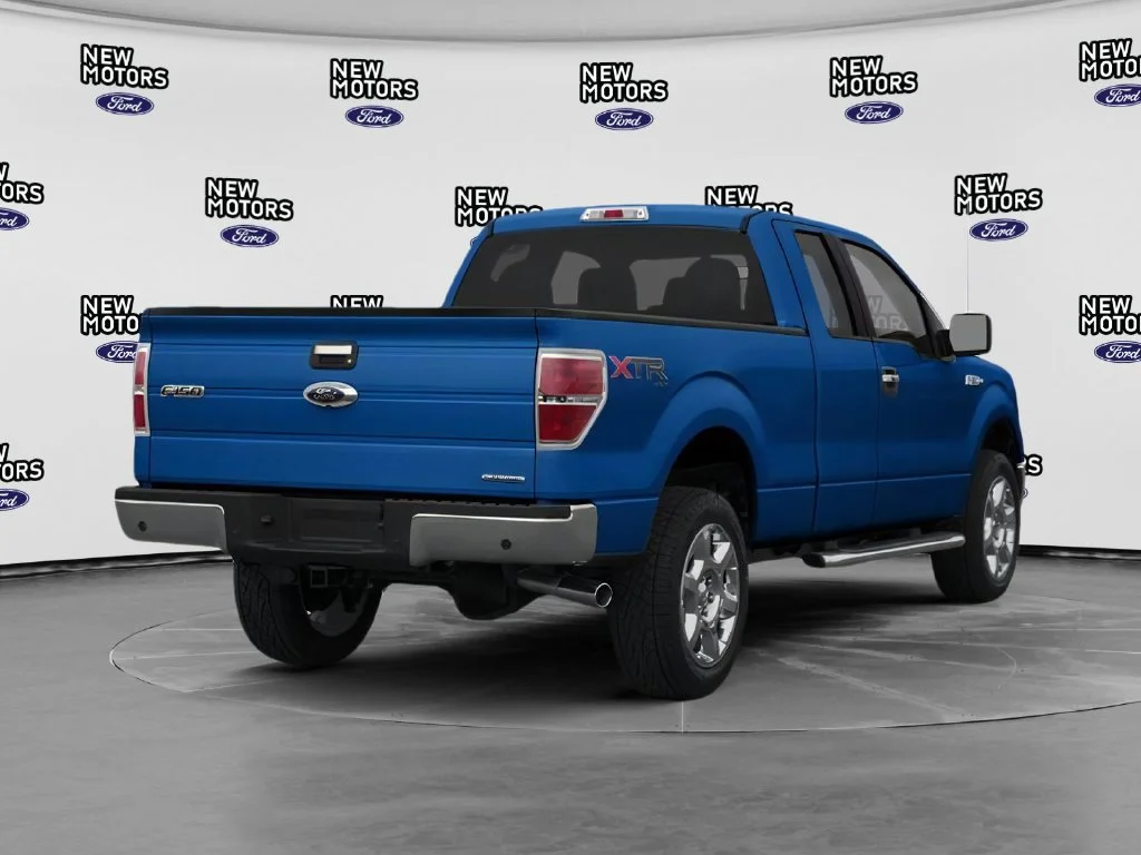 Used 2014 Blue Flame Metallic Ford STX image 2
