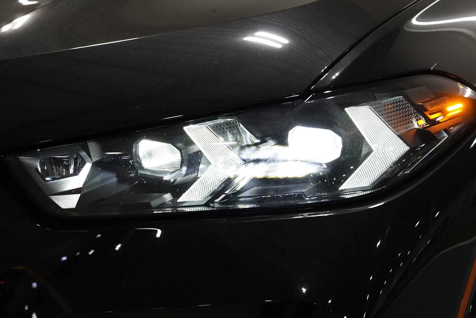 Used 2026 Black Sapphire Metallic BMW M60i image 6