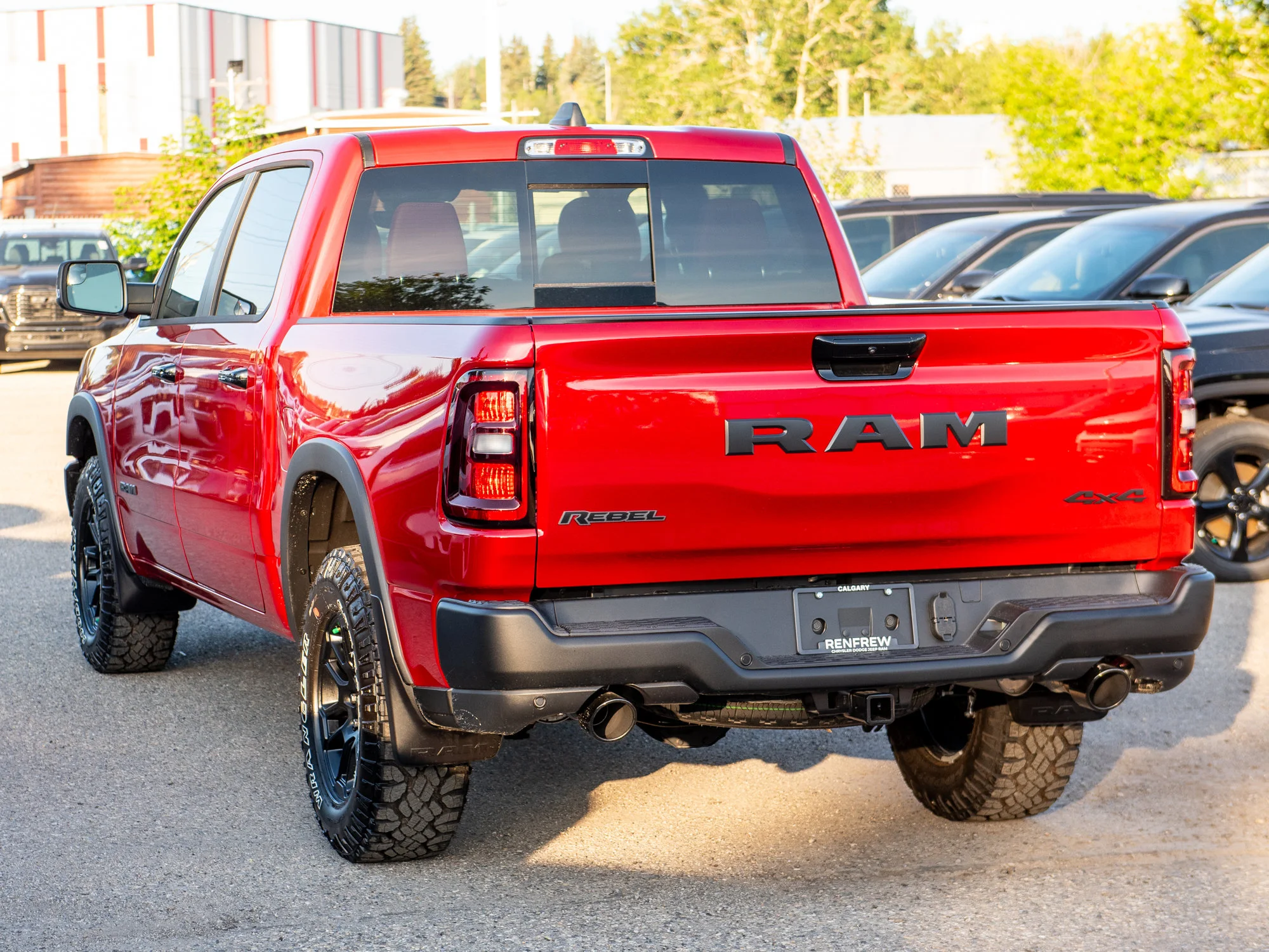 New 2026 Red RAM Rebel* Crew Cab 4x4, Pano Sunroof, 33 Inch A/T Tires, Passenger Screen image 5