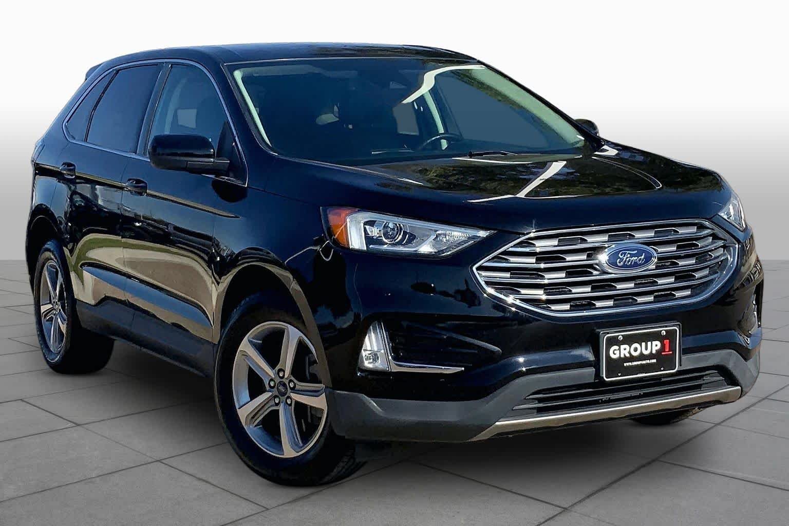 Certified Used 2022 Agate Black Metallic Ford SEL image 3