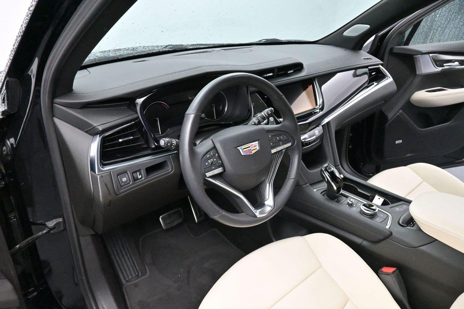 Used 2024 Stellar Black Metallic Cadillac Sport image 19
