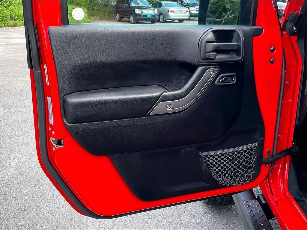Used 2017 Red Jeep Unlimited Sport image 9