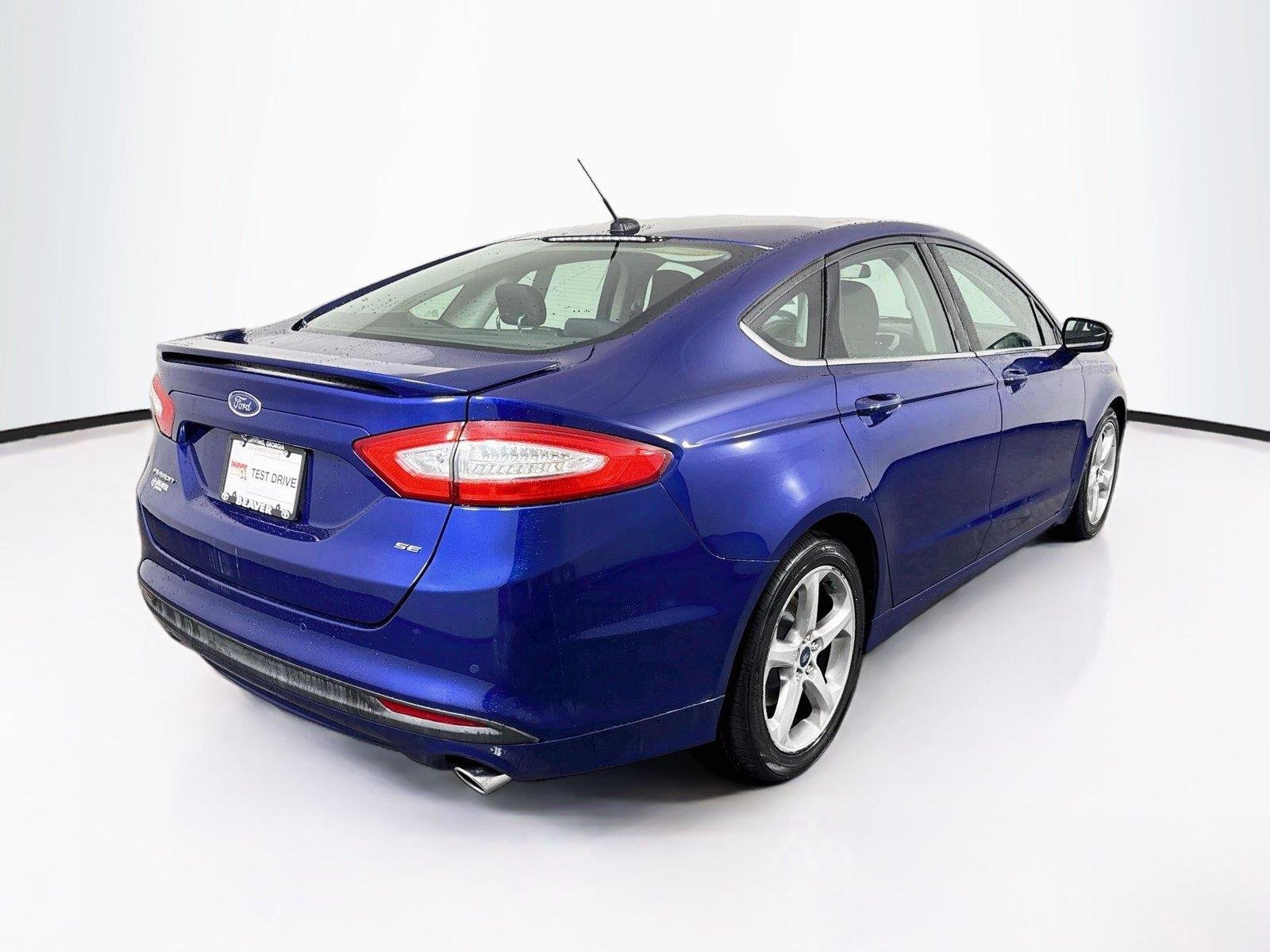 Used 2016 Deep Impact Blue Ford SE image 2
