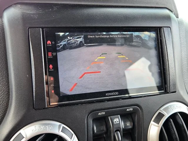 Used 2015 Red Jeep Unlimited Sahara image 23