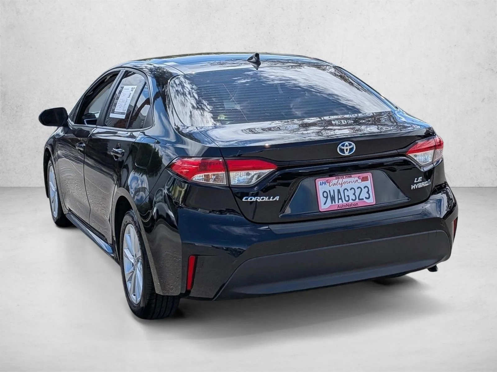 Used 2024 Midnight Black Metallic Toyota Hybrid LE image 8