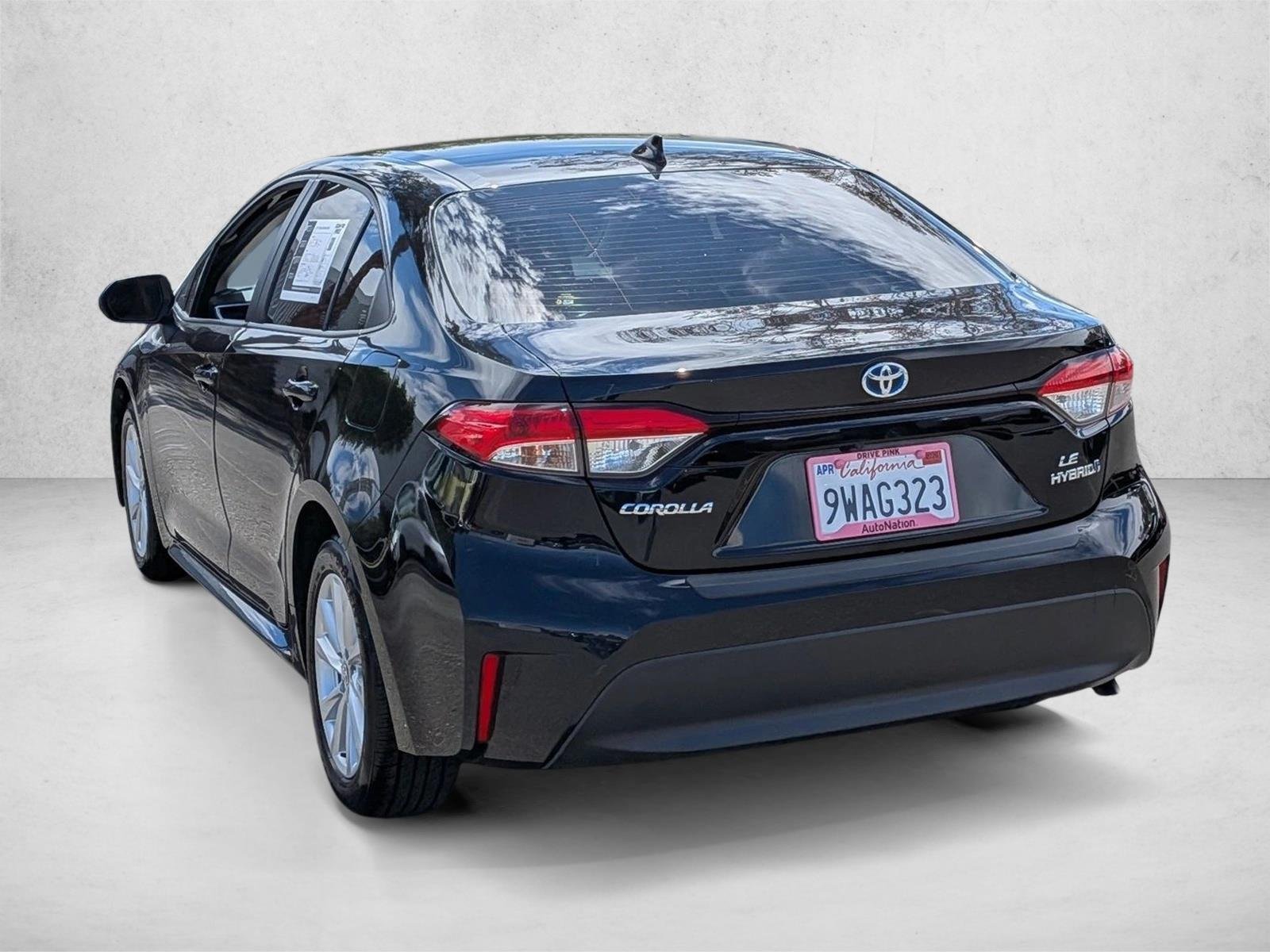 Used 2024 Midnight Black Metallic Toyota Hybrid LE image 8