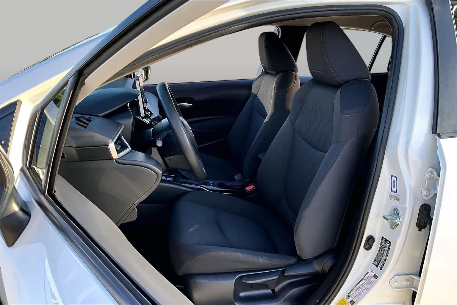Used 2021 Super White Toyota LE image 8