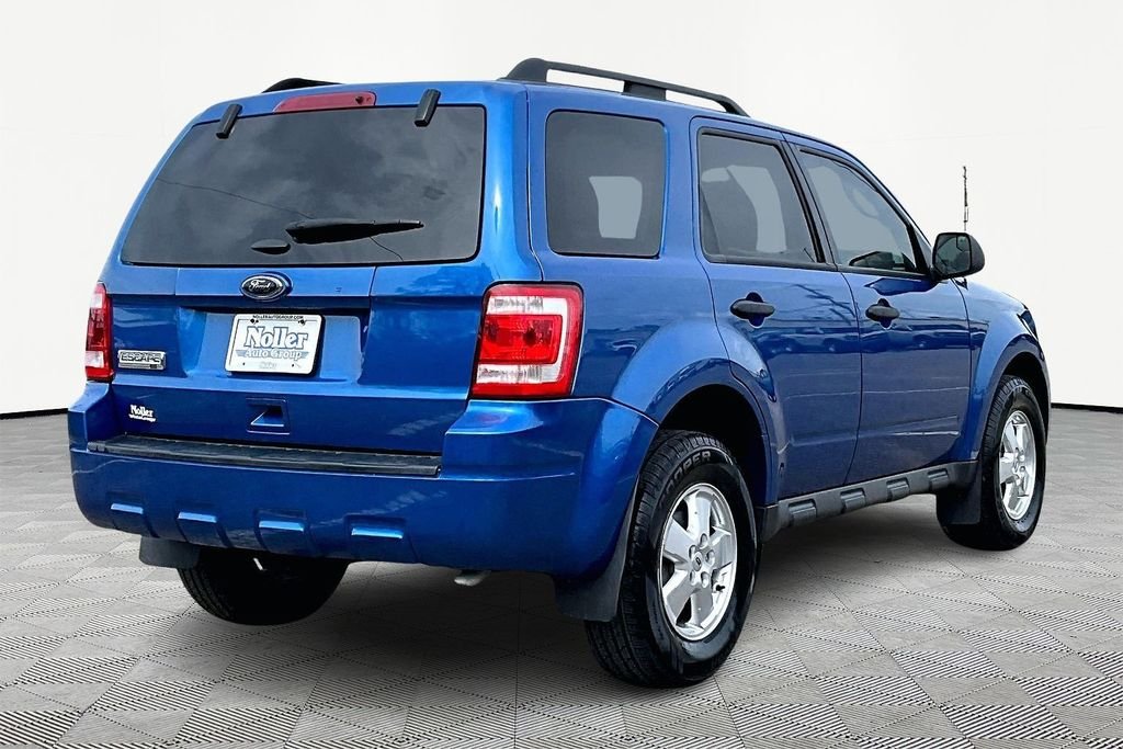 Used 2011 Ford Escape XLT with VIN 1FMCU9D76BKB61002 for sale in Kansas City