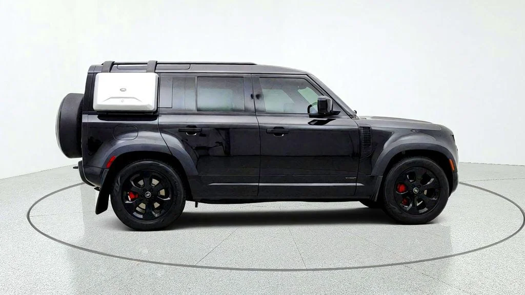 Used 2023 Santorini Black Metallic Land Rover 110 X AWD w/ Explorer Pack, Extended Black Ext. & Towing Pack image 4