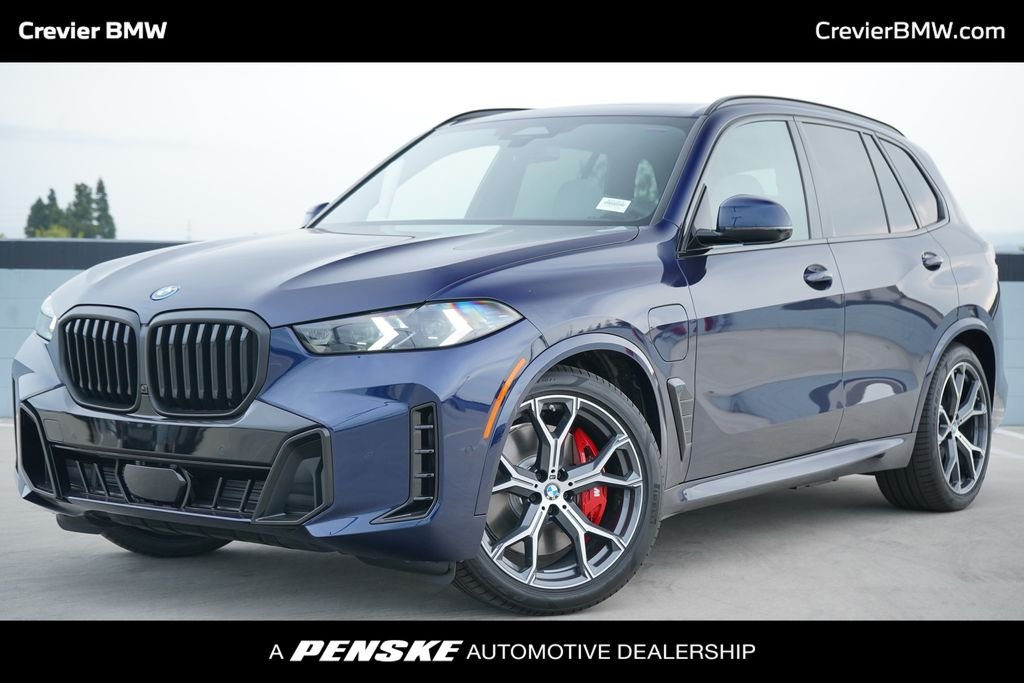New 2026 Tanzanite Blue II Metallic BMW xDrive50e image 1