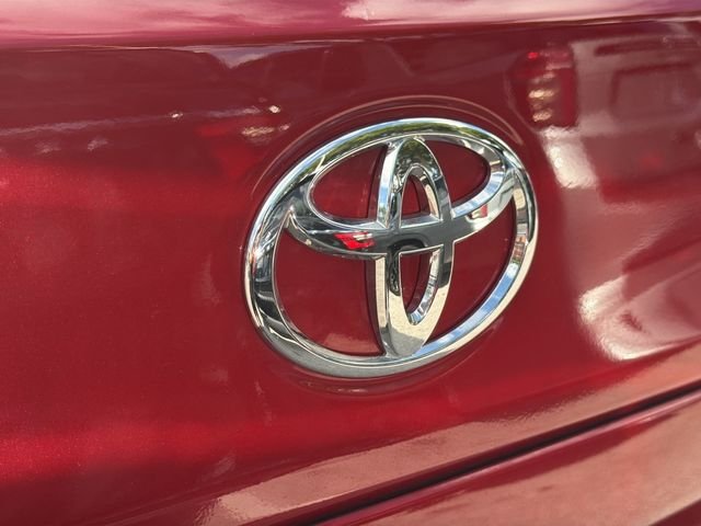 Used 2024 Barcelona Red Metallic Toyota LE image 9