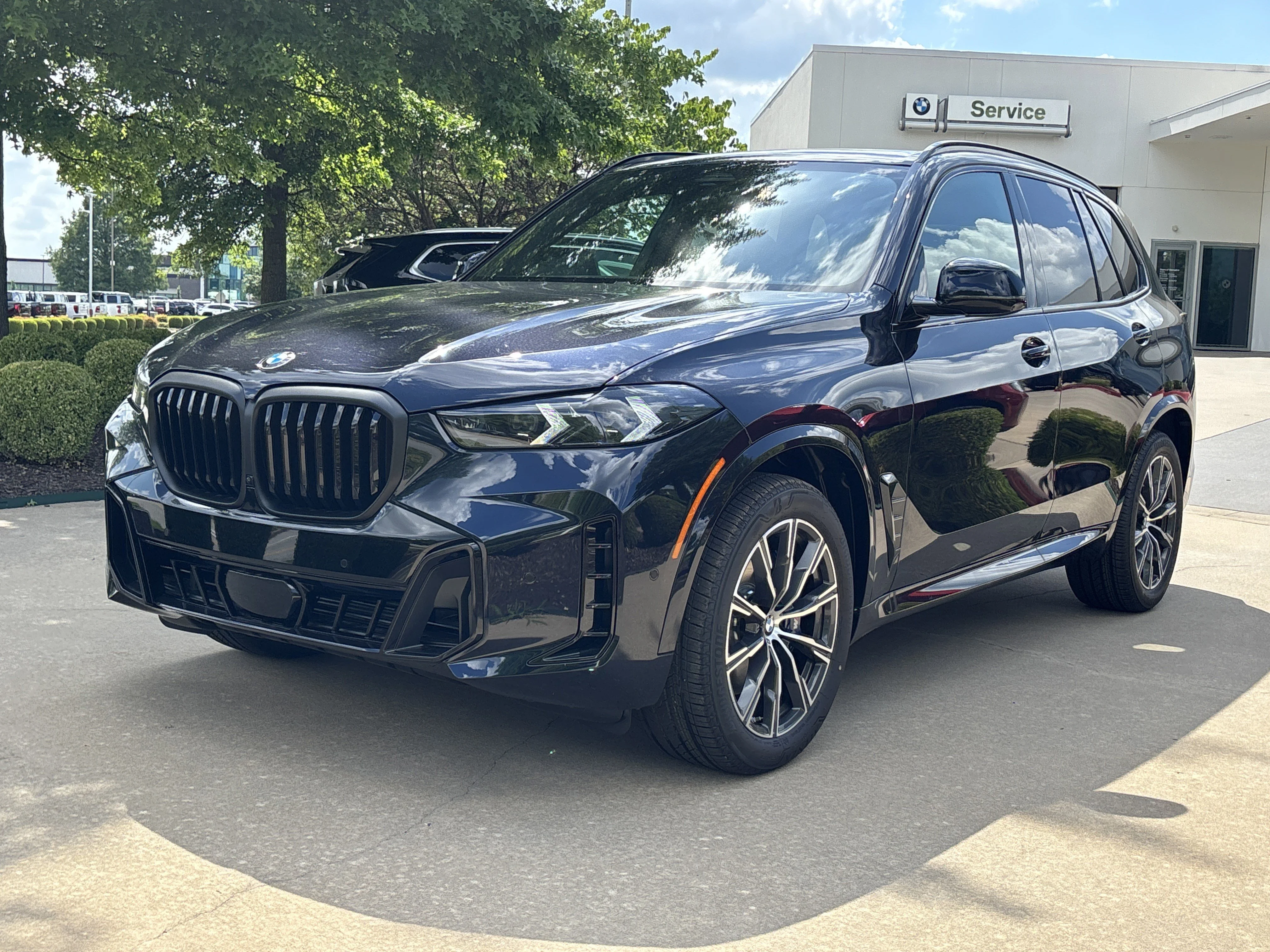 New 2026 0416 Carbon Black Metallic BMW xDrive40i image 1