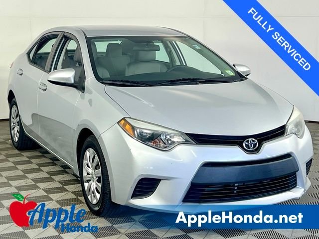 Used 2014 Classic Silver Metallic Toyota LE image 1