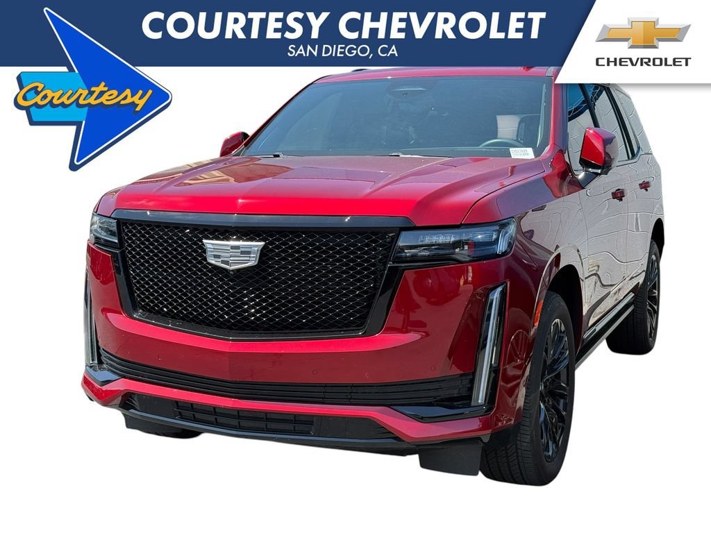 Used 2024 Radiant Red Tintcoat Cadillac Sport Platinum image 1