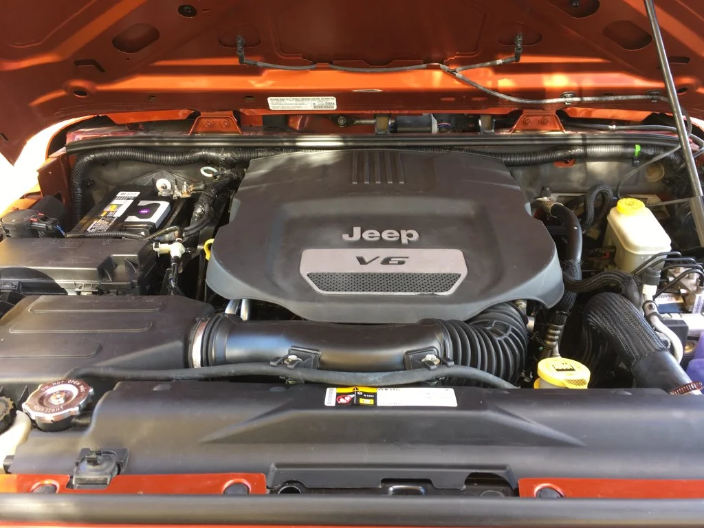 Used 2014 Orange Jeep Sport image 13