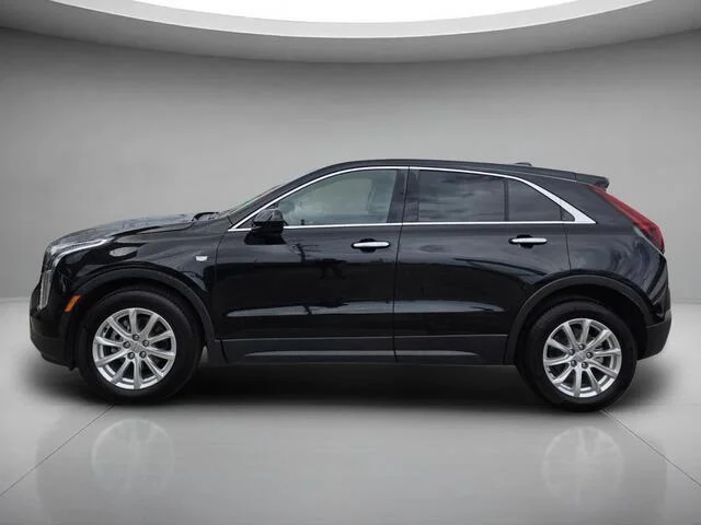 Used 2023 Stellar Black Metallic Cadillac FWD Luxury image 2