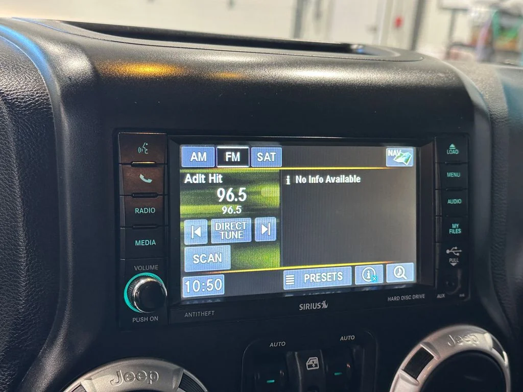 Used 2016 Black Jeep Unlimited Sahara image 18