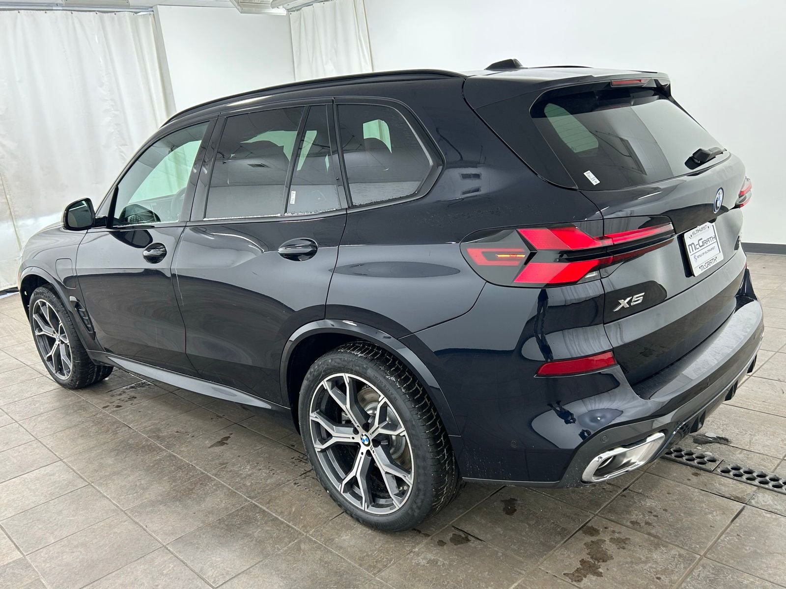 New 2026 Carbon Black Metallic BMW xDrive50e image 3