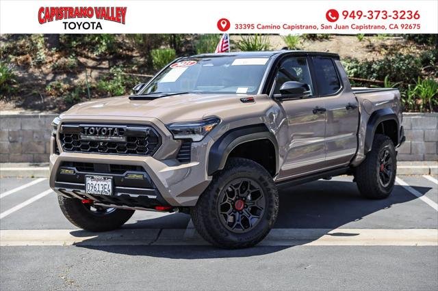 Certified Used 2025 BLACK(202)/MUD BATH(4Z2) Toyota  image 1