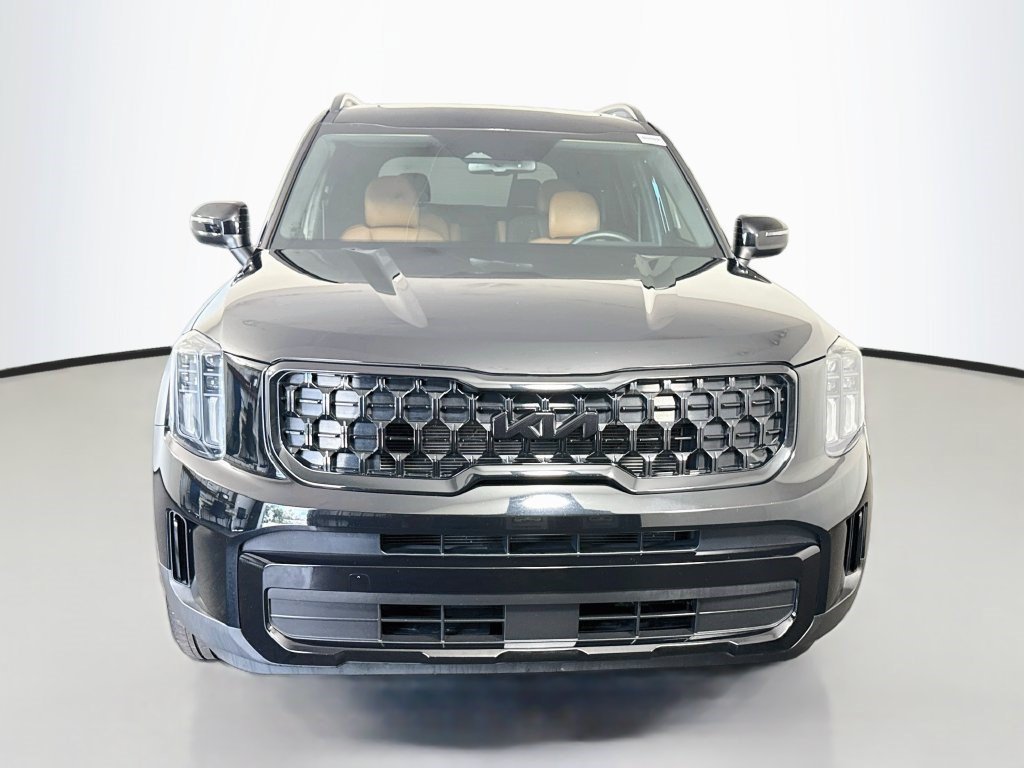 Used 2025 Ebony Black Kia EX X-Line image 2