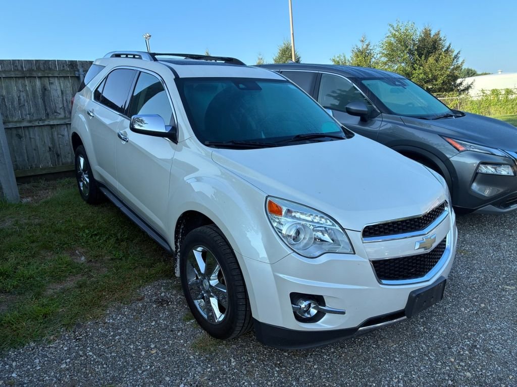 Used 2013 White Diamond Clearcoat Chevrolet LTZ image 1