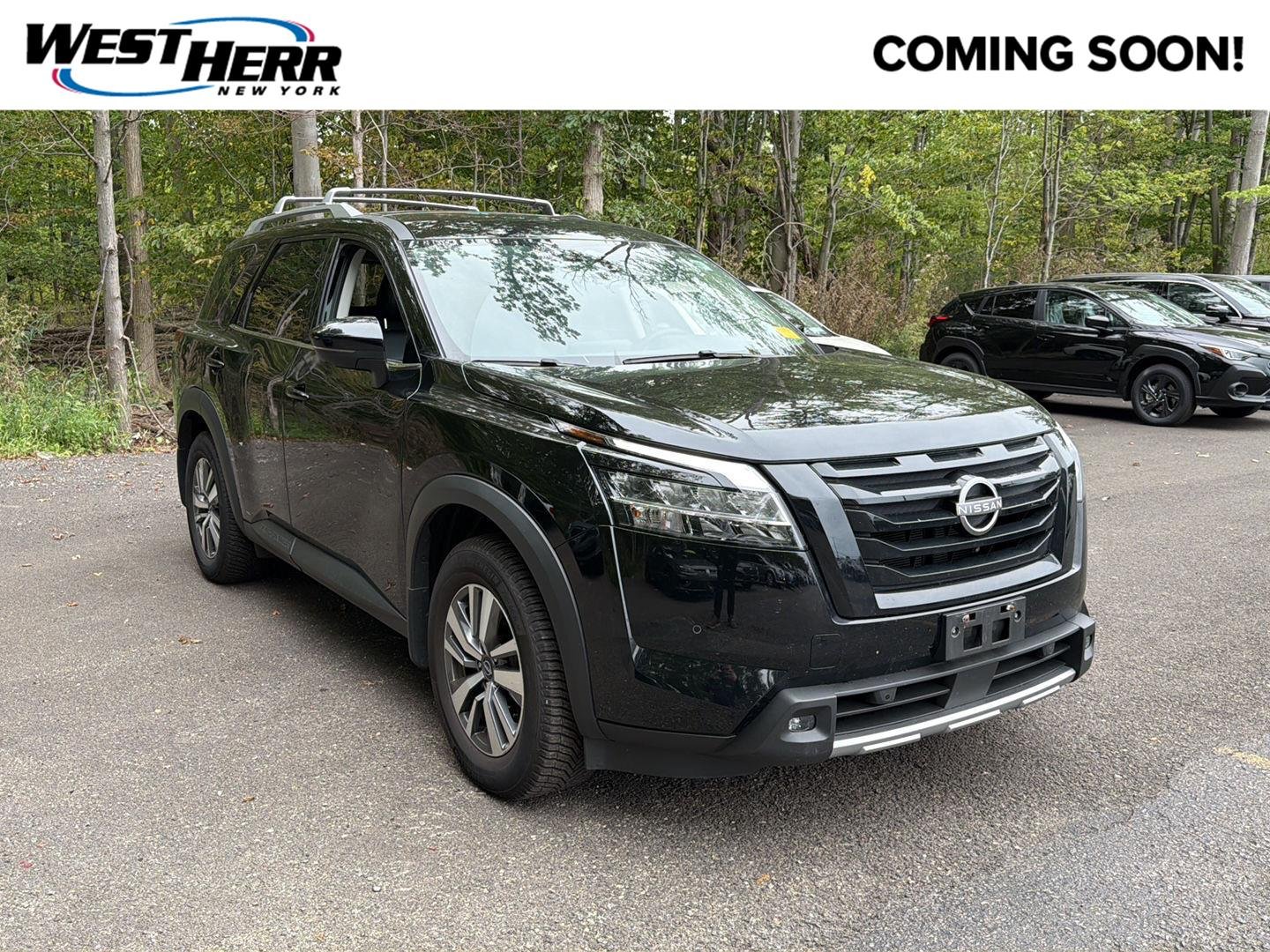 Used 2023 Super Black Nissan SL image 1