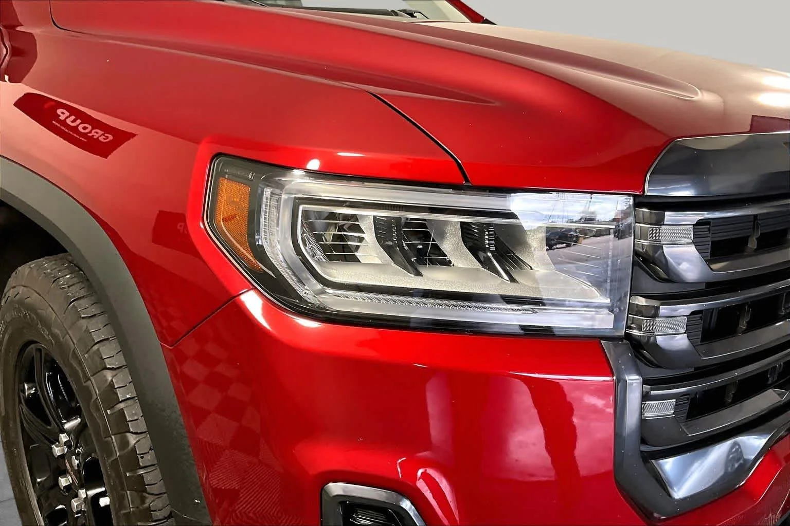 Used 2023 VOLCANIC RED TINCOAT GMC AT4 image 53
