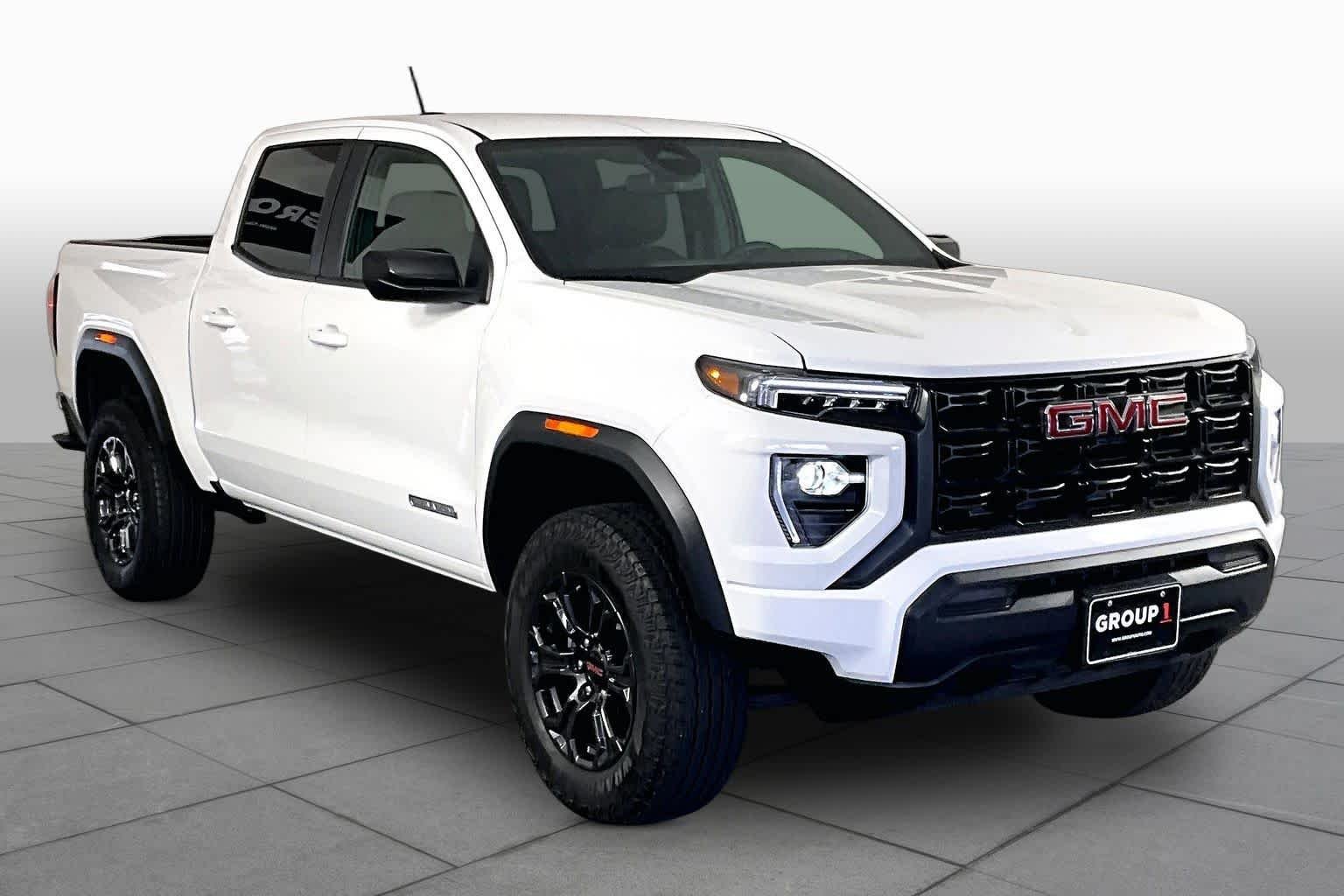 Used 2024 Summit White GMC 2WD Elevation image 3