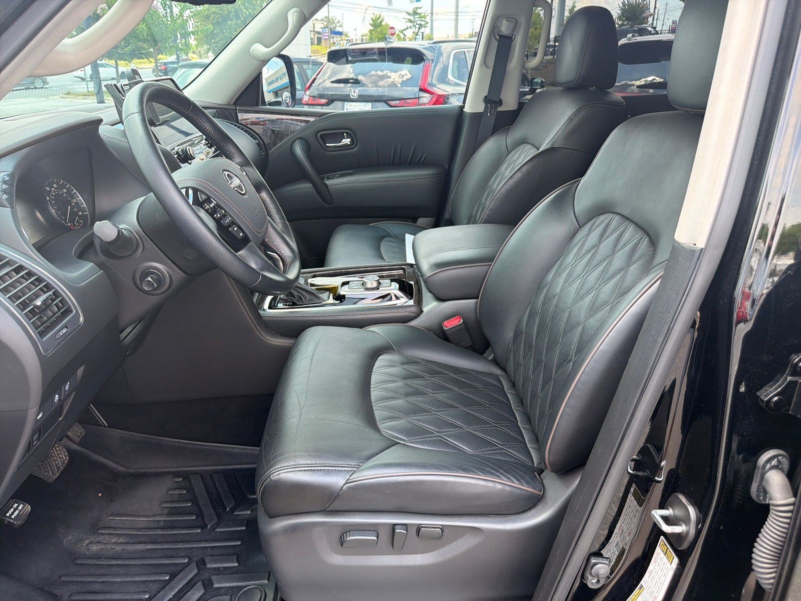 Used 2024 Super Black Nissan Platinum image 9