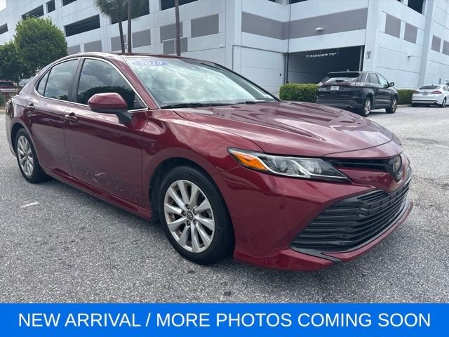 Used 2019 Red Toyota LE image 1