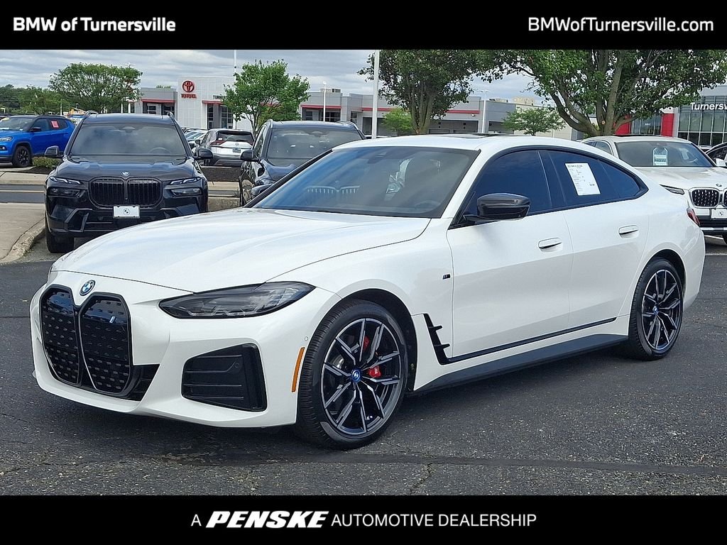 Certified Used 2023 Alpine White BMW eDrive40 image 1