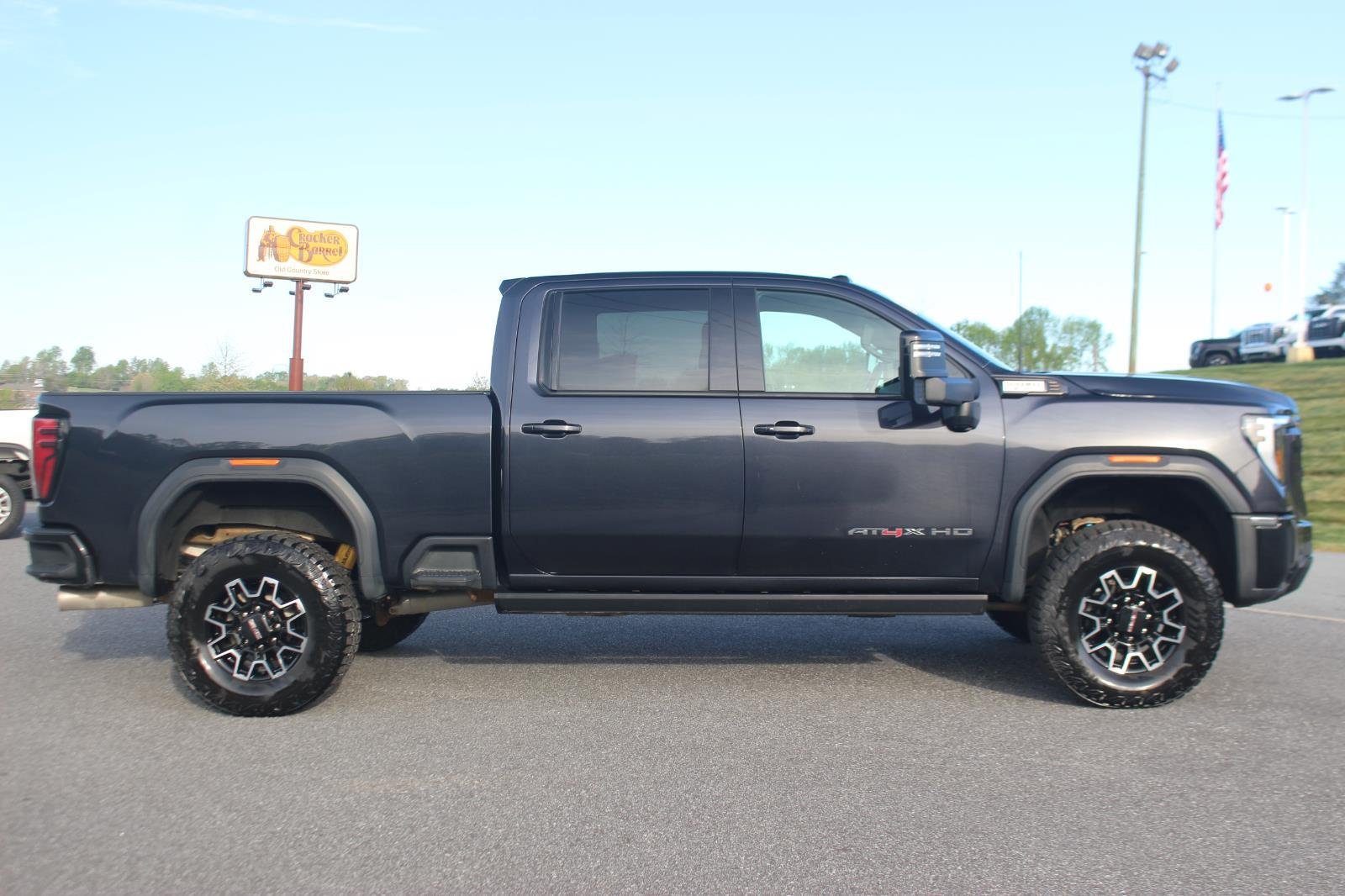 Used 2024 Titanium Rush Metallic GMC AT4X image 8