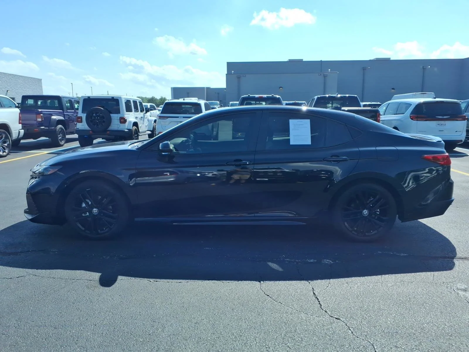 Used 2025 Midnight Black Metallic Toyota SE image 4