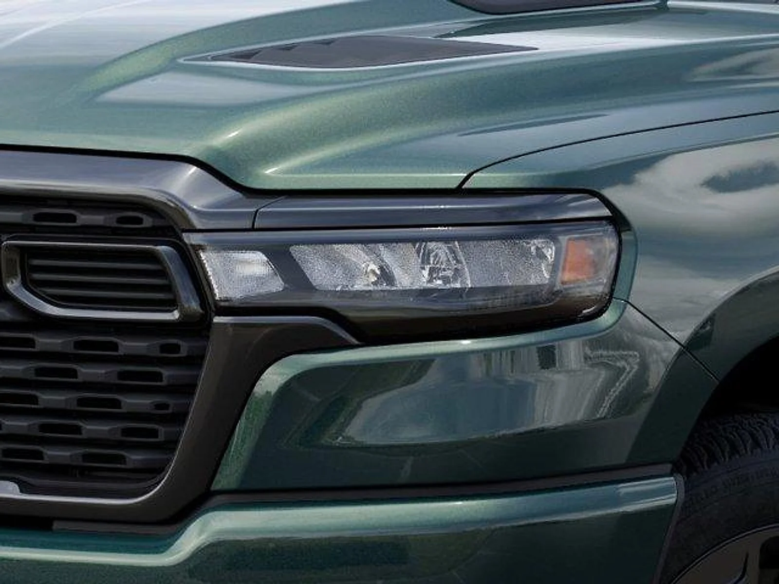 New 2026 Serrano Green Metallic RAM Express Quad Cab 4x4 6