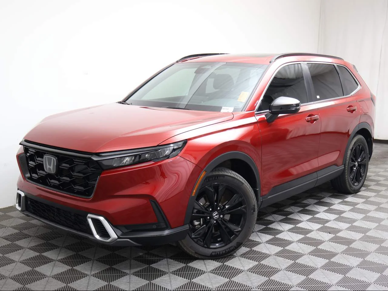 Used 2025 Radiant Red Metallic Honda Sport Touring image 1