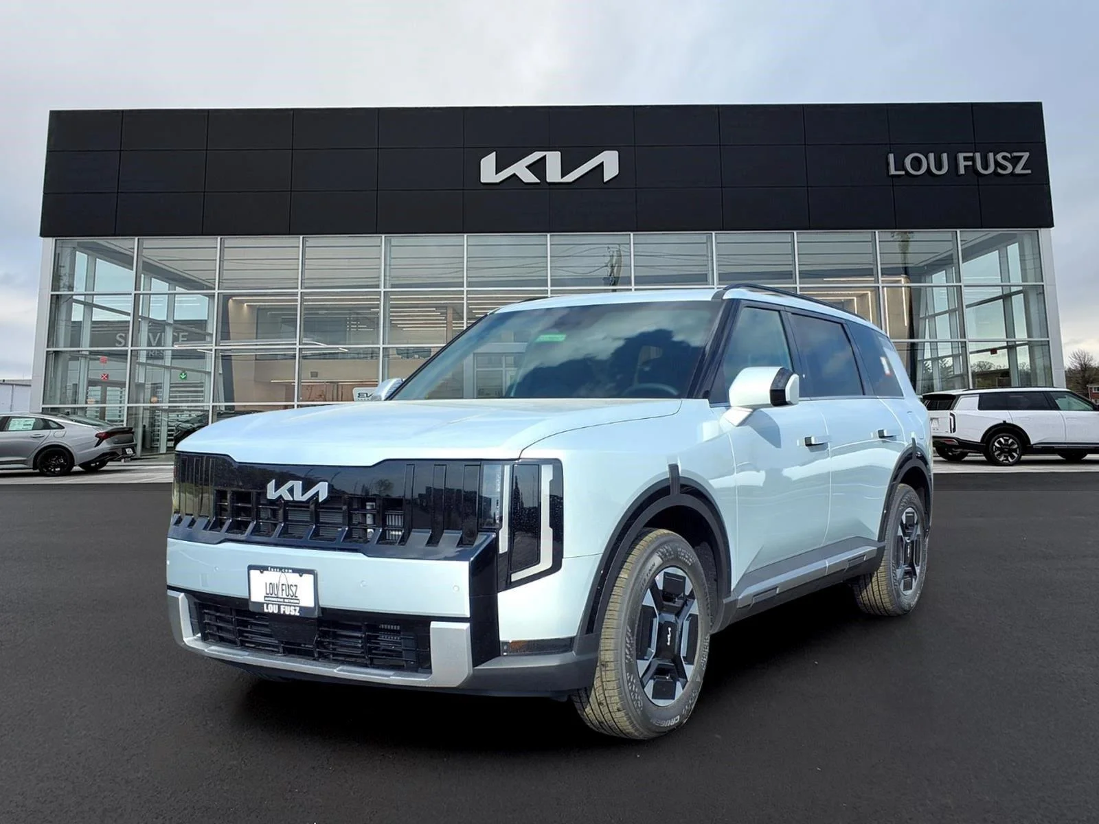 New 2027 Ivory Silver Kia EX image 1