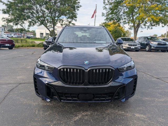 Certified Used 2026 Tanzanite Blue II Metallic BMW xDrive50e image 8