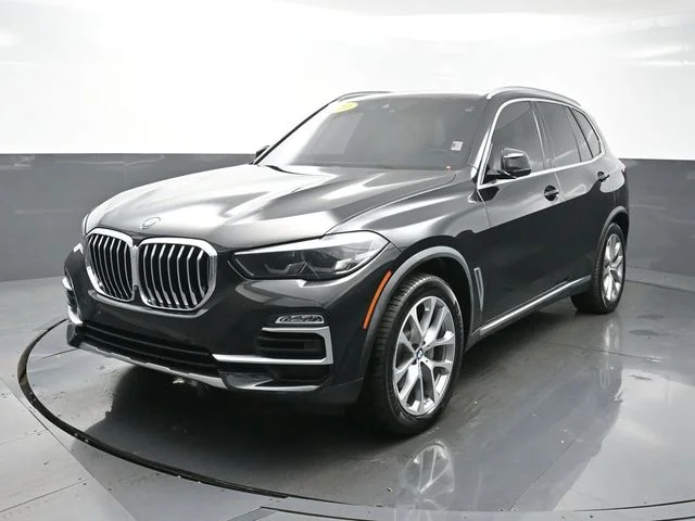 Used 2020 Black BMW sDrive40i image 1
