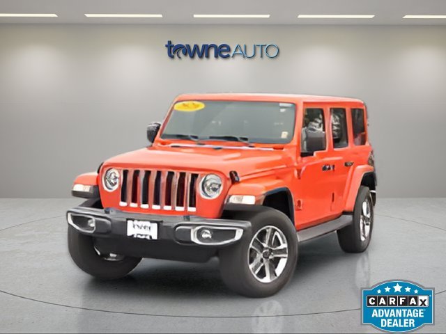Used 2020 Orange Jeep Unlimited Sahara image 1