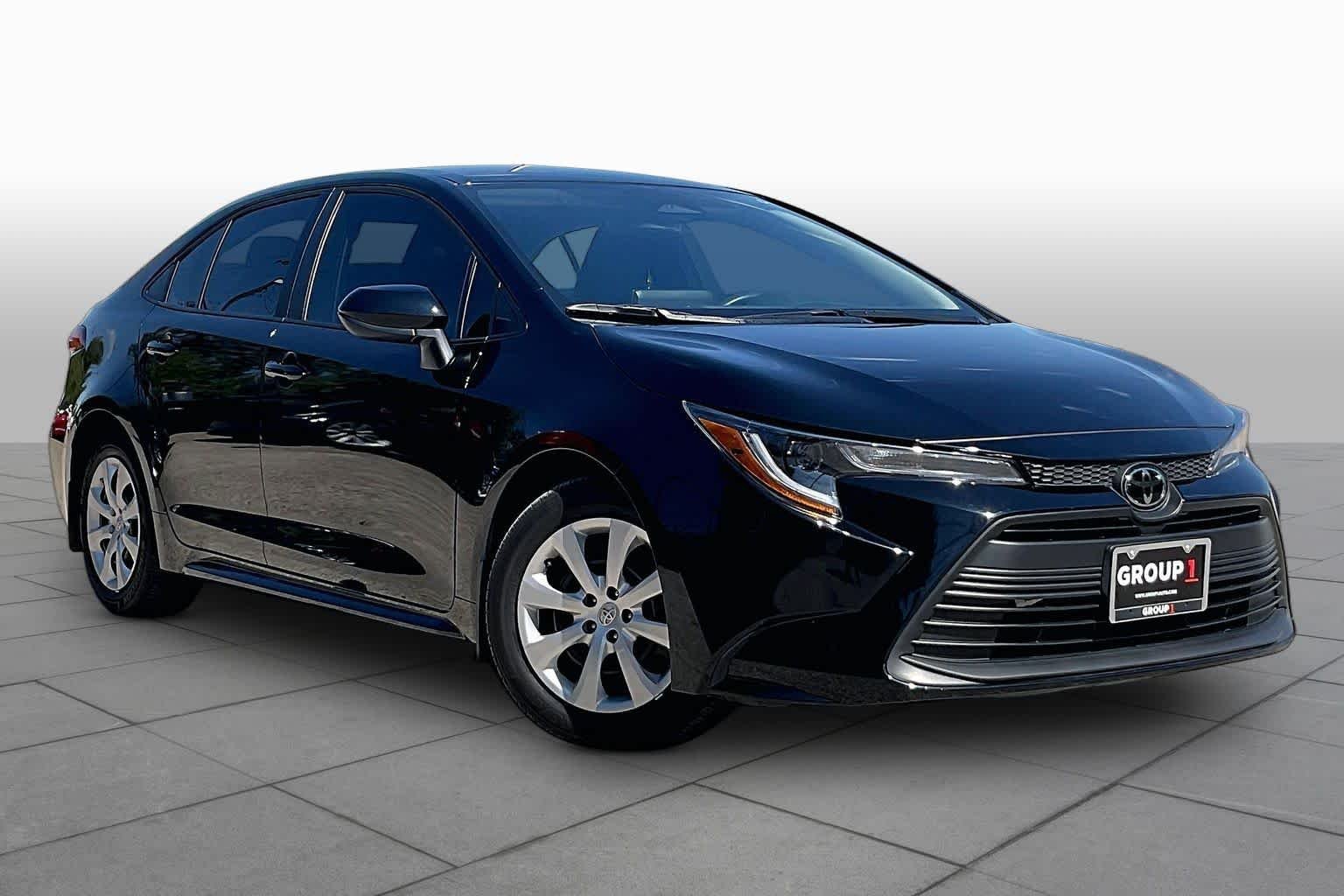 Used 2025 Midnight Black Metallic Toyota LE image 3