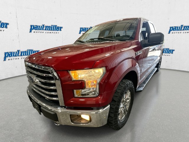 Used 2016 Ruby Red Ford XLT image 1
