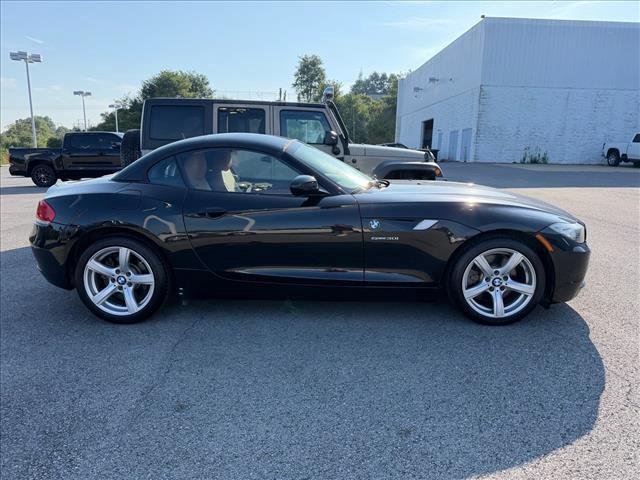 Used 2011 Black Sapphire Metallic BMW sDrive30i image 4