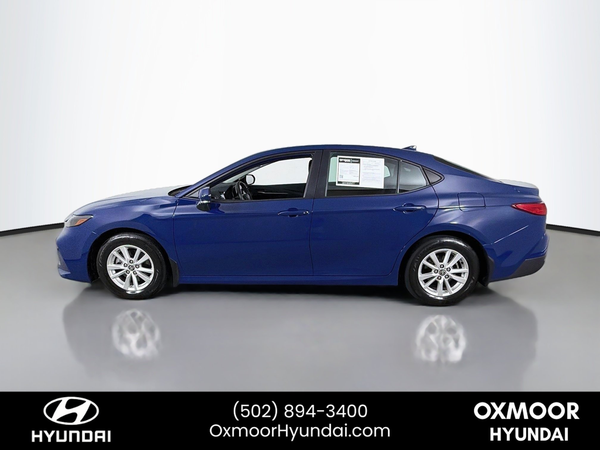 Used 2025 Reservoir Blue Toyota LE image 4
