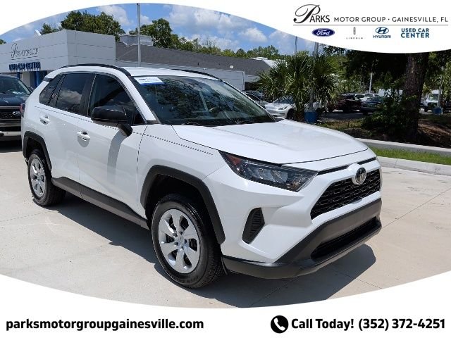 Used 2021 White Toyota LE image 1