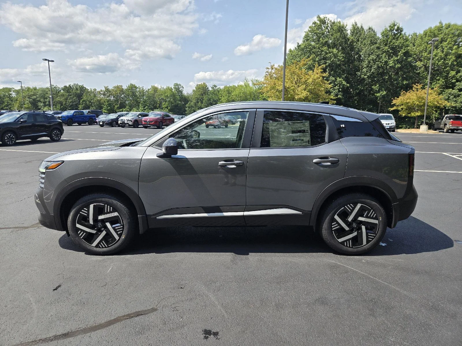 New 2026 Gun Metallic Nissan SV image 5