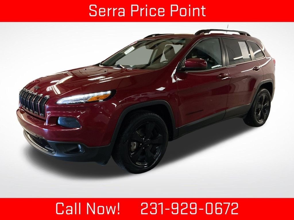 Used 2016 Red Jeep Limited image 1