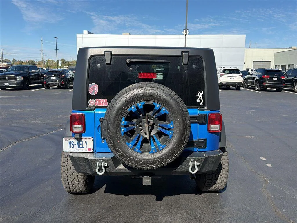 Used 2015 Hydro Blue Pearl Coat Jeep Sport image 7